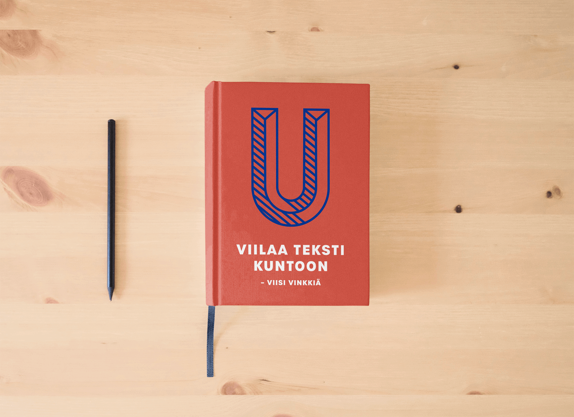 Kind artikkelikuva, jossa kirja on pöydällä, ja kaneessa lukee "Viilaa teksti kuntoon"